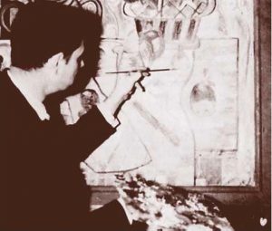 old black and white photo of man with palette painting 