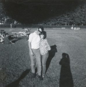 young man and woman in park