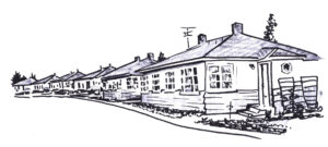 older 1-story row houses along roadside
