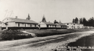 set of bungelows on a road, 1950s era