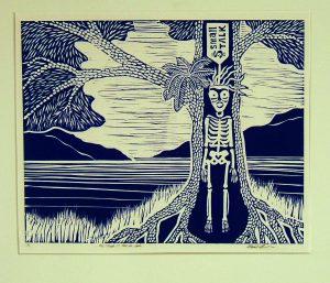 burial box/totem with ocean and mountains behind